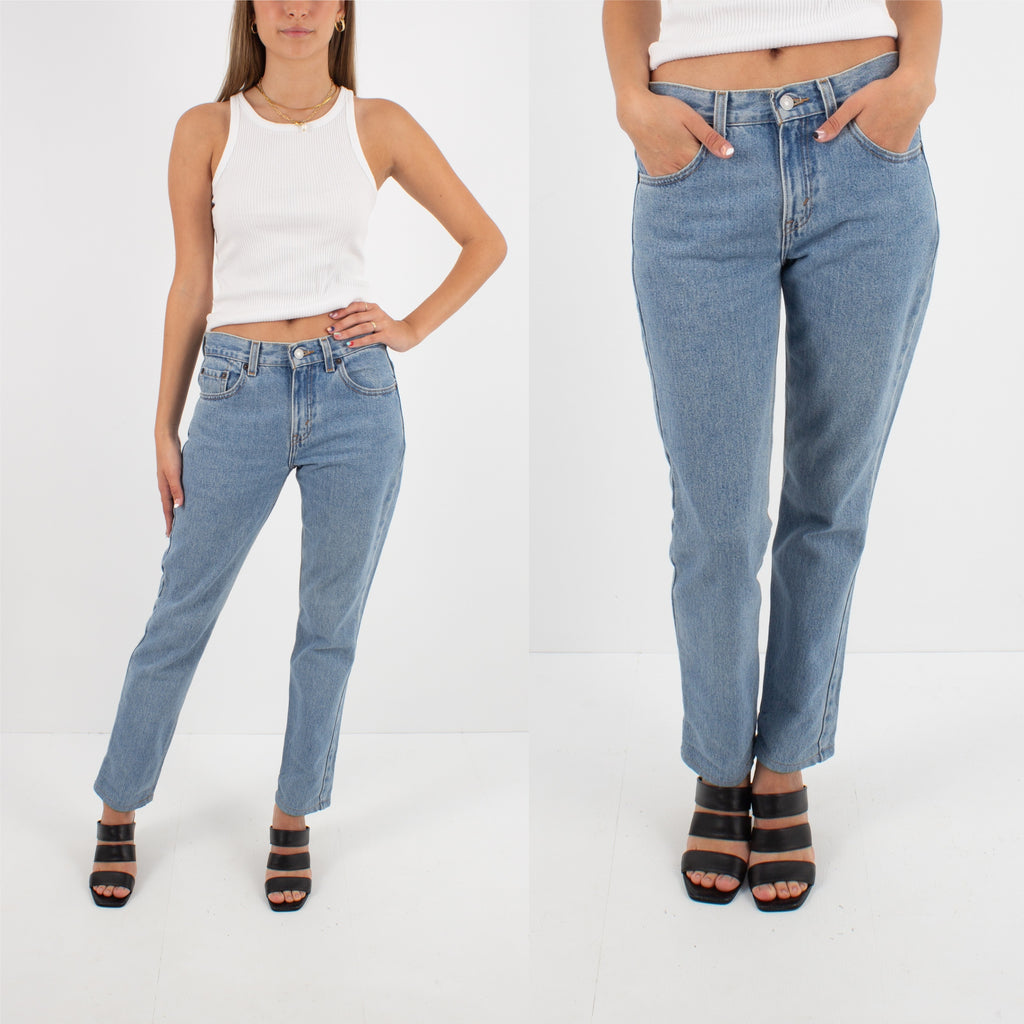 Levis Jeans 505 Mid Rise Tapered Leg in Light Blue Wash